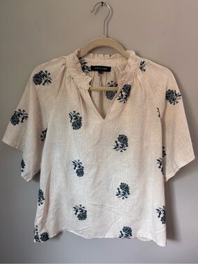 Solitaire Cream Top with Blue Floral Print and Ruffle Neck